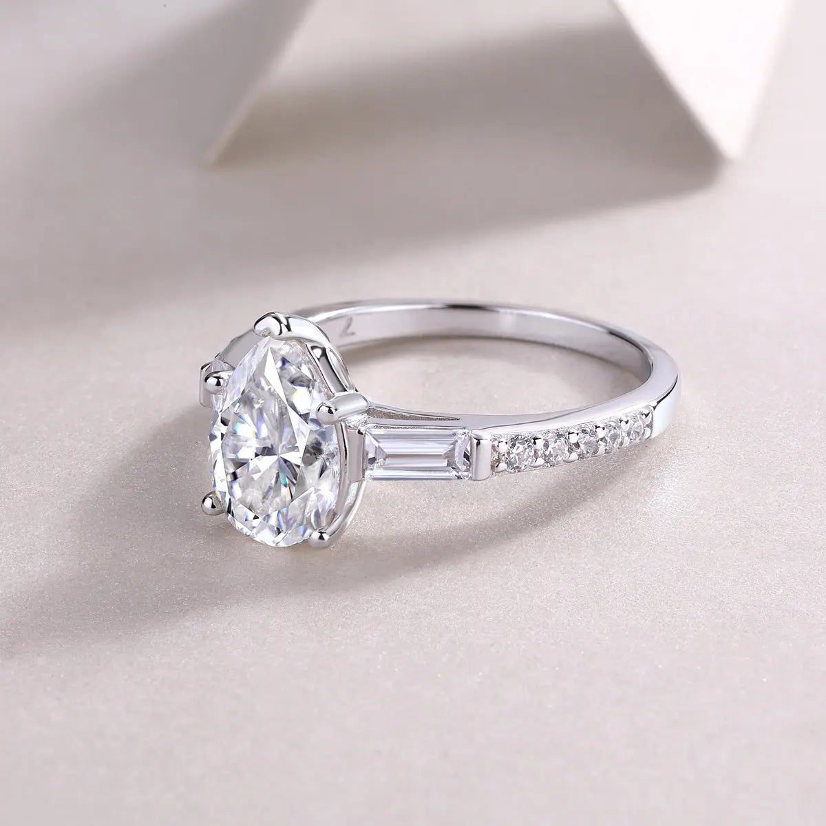 1.5CT Pear Moissanite Ring | Sterling Silver Side Stones LuxeStones